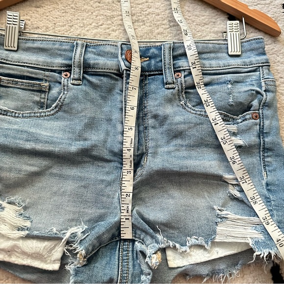 AE Light Wash Distressed High Rise Shortie Eyelet Pockets Denim Shorts - Picture 6 of 9